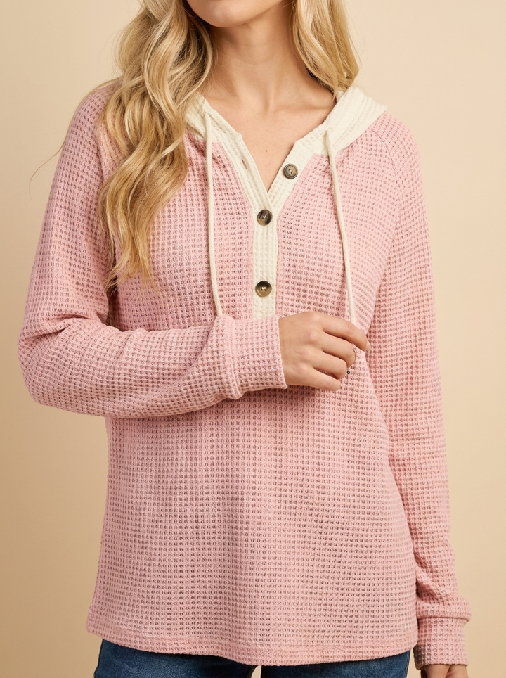 Sudadera Alma con capucha color rosa, vista frontal
